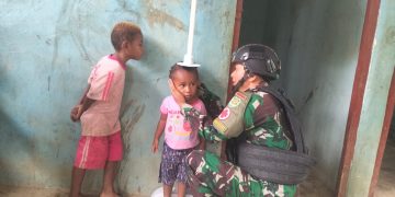 Jamin Tumbuh Kembang Balita, Satgas Yonif 310/KK Gelar Posyandu Di Perbatasan RI-PNG