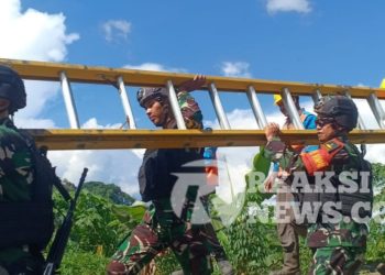 Pastikan Pasokan Listrik Lancar Di Perbatasan, Satgas Yonif 310/KK Respon Keluhan Warga
