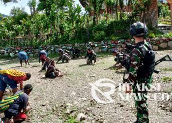 Sambut Hari Jadi Gereja Ke-60, Satgas Yonif 310/KK Bersama Warga Gelar Karya Bakti