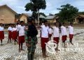 Melalui Baris Berbaris, Satgas Yonif 310/KK Ajarkan Siswa Arti Kedisplinan