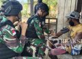 Tingkatkan Jangkauan Dan Mutu Pelayanan Kesehatan, Satgas Yonif 310/KK Gelar Pengobatan Keliling