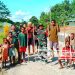 Asyiknya Permainan Tradisional, Satgas Yonif 310/KK Bersama Anak Papua Bermain Egrang