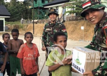 Lestarikan Budaya, Satgas Yonif 310/KK Gelar Lomba Jubi Untuk Anak-Anak Papua