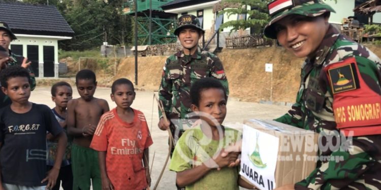 Lestarikan Budaya, Satgas Yonif 310/KK Gelar Lomba Jubi Untuk Anak-Anak Papua