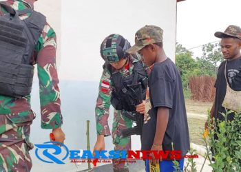 Perindah Gereja, Satgas Yonif 310/KK Lakukan Pengecatan Dan Pembenahan