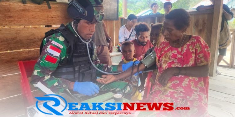 Bakti Kesehatan, Satgas Yonif 310/KK Gelar Posyandu Di Perbatasan