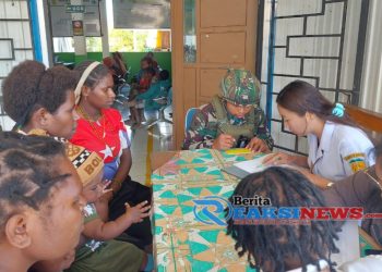 Satgas TNI Bekerjasama Dengan Puskesmas Sinak Gelar Imunisasi Polio Disambut Antusias Warga