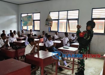 Peduli Gizi Anak-Anak Papua, Satgas Yonif 310/KK Bagikan Susu dan Biskuit