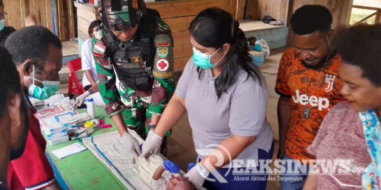 Pelayanan Kesehatan Harus Mendapatkan Perhatian Khusus, Satgas Yonif 310/KK Gelar Posyandu