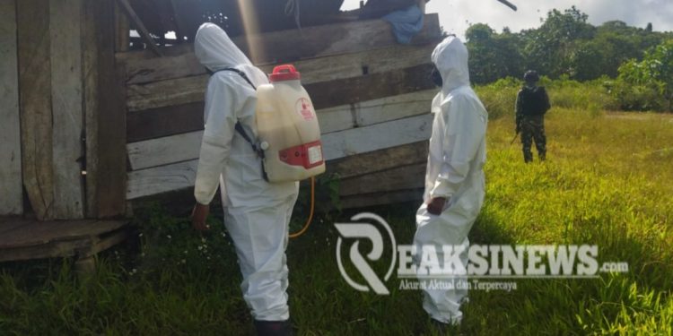 Penyemprotan Residu dan Berikan Pelayanan Kesehatan, Kiat Satgas Yonif 310/KK Cegah Malaria di Papua