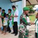Usai Ibadah Bersama, Satgas Yonif 310/KK Berikan Bantuan Kepada GKI Imanuel Woslay