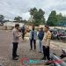 Anggota Patroli Himbau Tukang Parkir Agar Tertib Pada Peraturan