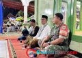 Babinsa Sukaharja Koramil 2203/Warungkiara Bareng Kades Hadiri Isra Mi’raj 1446 H