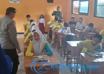 Polsek Sagaranten Dan Koramil 0622/Sagaranten Dampingi Penyaluran Makan Gratis Siwa Di Sagaranten
