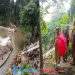 Akibat diguyur hujan deras, bendungan sungai warung kalapa jebol. Yudi Camat Lembursitu dan jajaran DPUTR Kota Sukabumi respons cepat turun langsung ke lokasi