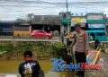 Curah Hujan Tinggi, Polsek Baros Siaga Patroli Siaga Banjir Antisipasi Luapan Sungai Cisuda