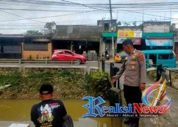 Curah Hujan Tinggi, Polsek Baros Siaga Patroli Siaga Banjir Antisipasi Luapan Sungai Cisuda