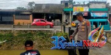Curah Hujan Tinggi, Polsek Baros Siaga Patroli Siaga Banjir Antisipasi Luapan Sungai Cisuda