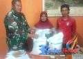 Babinsa Hegarmanah Serda Cahyana Koramil 2203/Warungkiara Kawal Penyaluran Banpang, 746 KPM Terima 20 Kg Beras dan 4 Liter Minyak